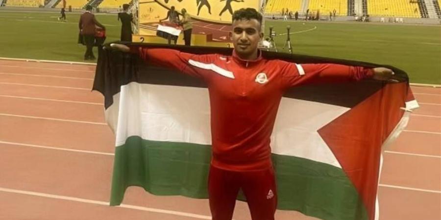 استشهاد العداء الفلسطيني علام عبد الله العمور من طرف قوات الاحتلال أثناء انتظاره الحصول على المساعدات